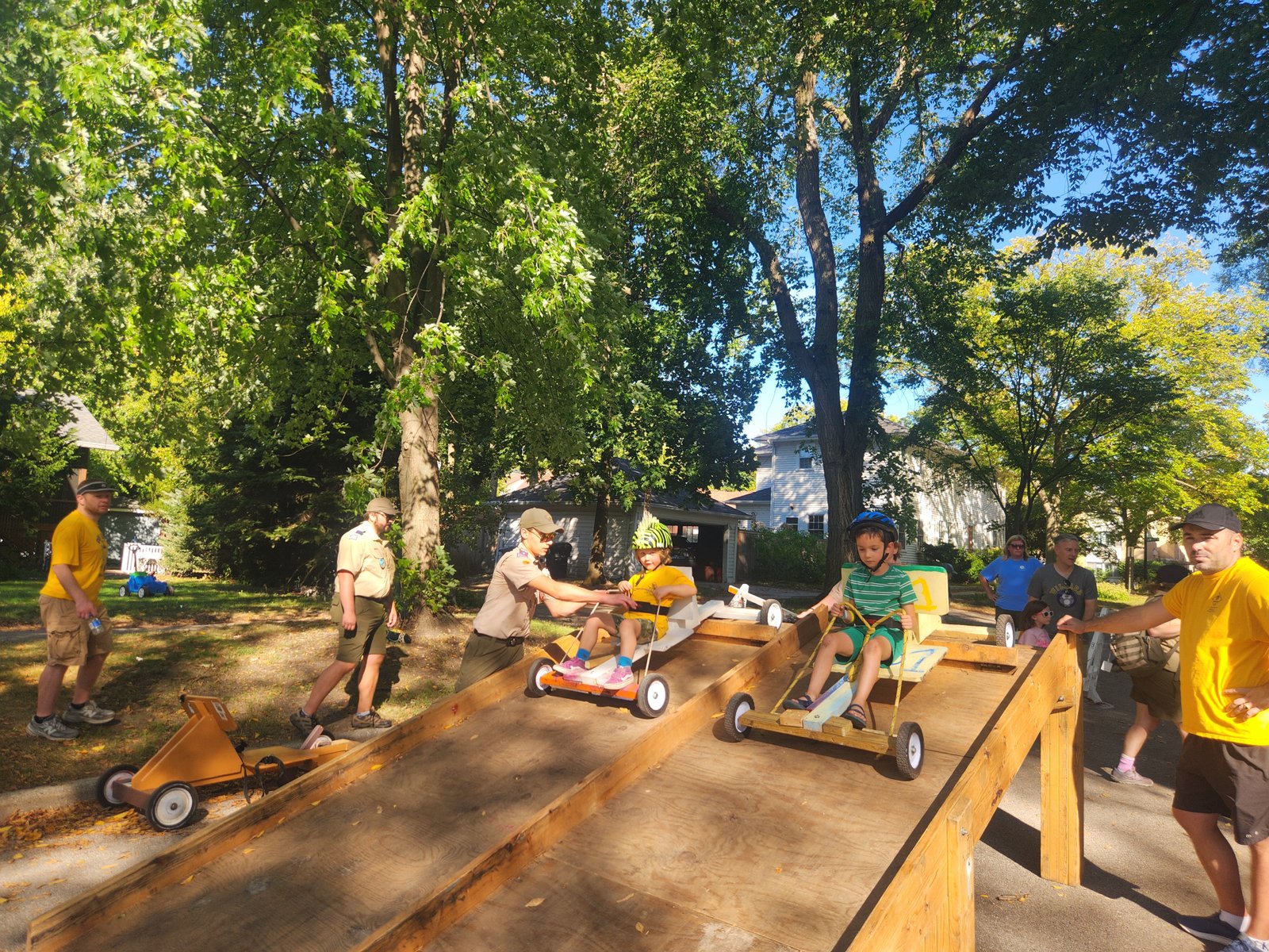 Wilmette Pack 1 scouts with a handmade wooden derby cart